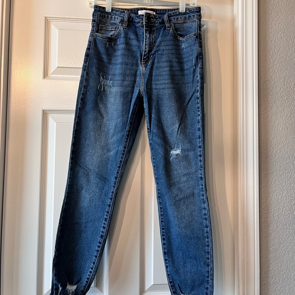Blue Straight Leg Jeans with Distressed Detail